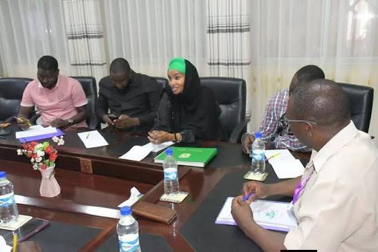 Boardroom strategy meeting with county partners